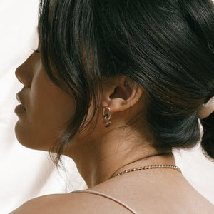 gold plated, glass, earrings, on model, tan.