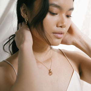 gold plated, glass, necklace, tan, model. 