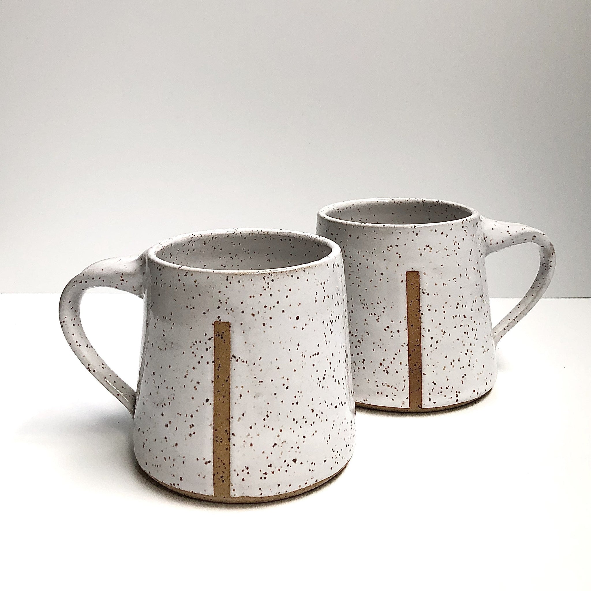 short ceramic mug glossy speckled white